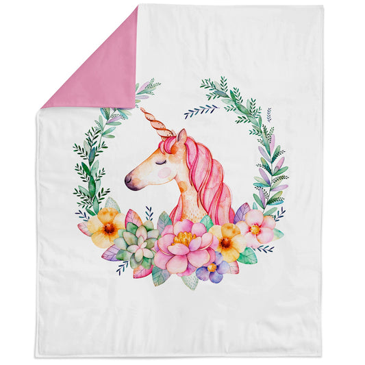 Blanket with a unicorn and floral design on a white background