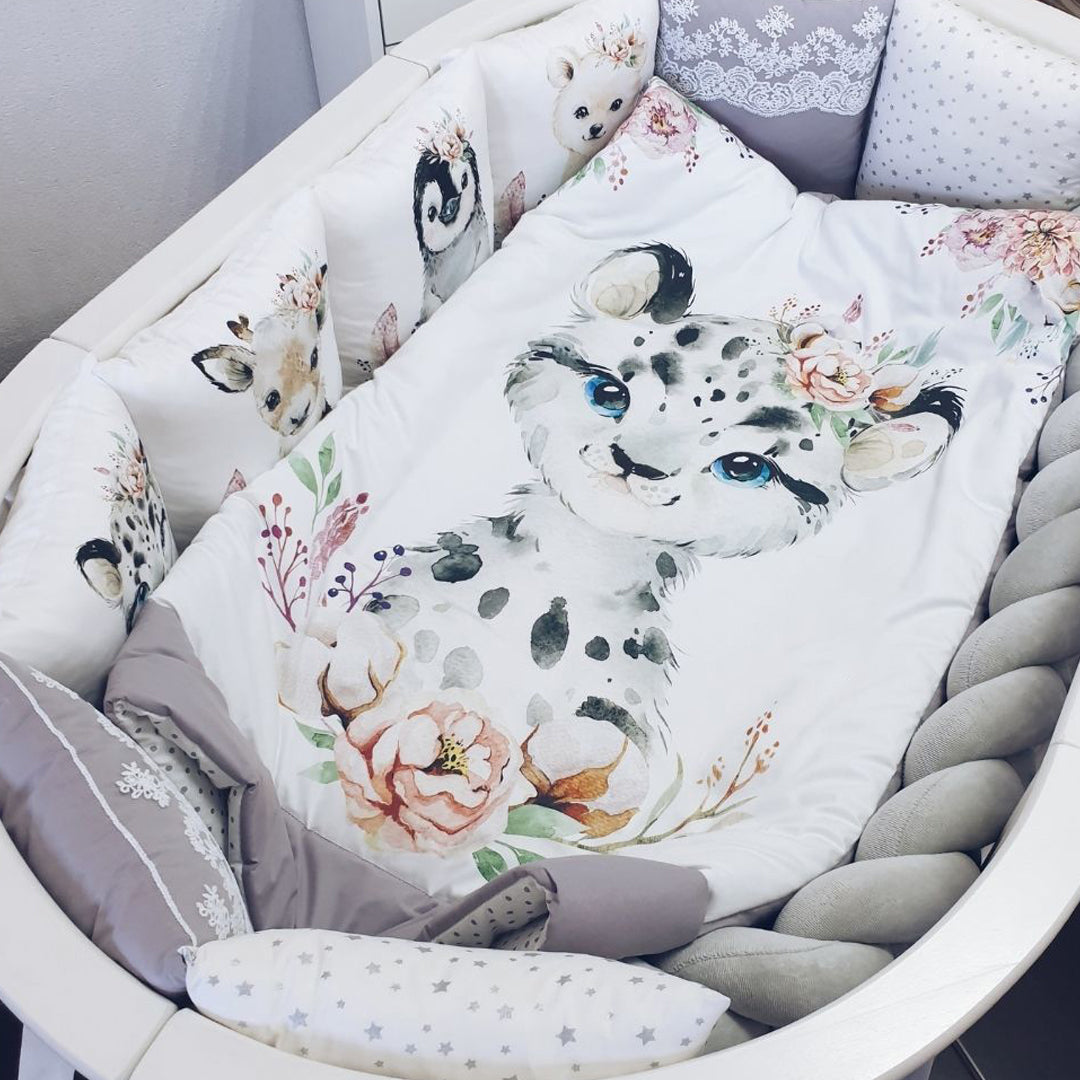 Cotton fabric with a print of white snow leopard