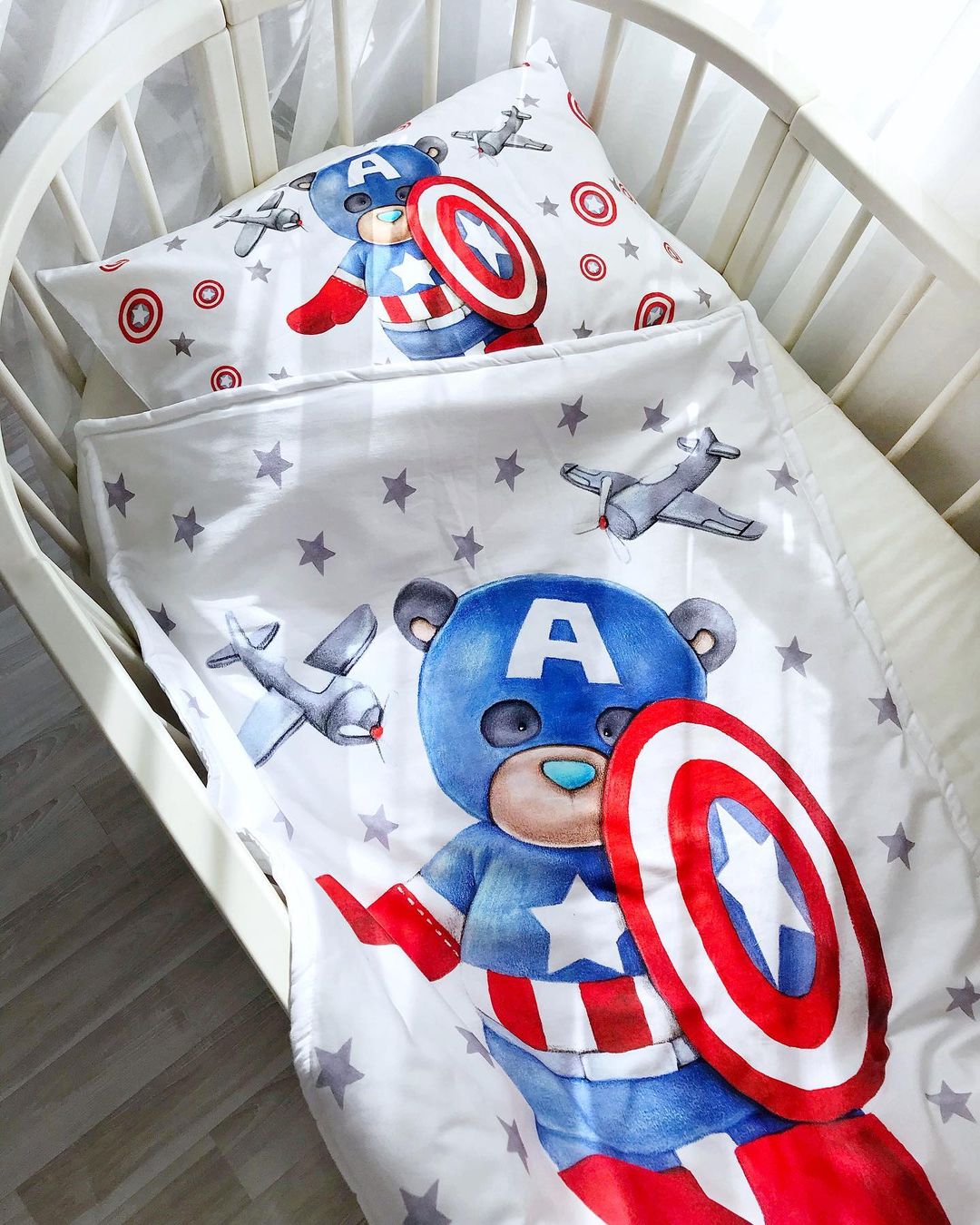 Cotton fabric with a print of Capitan America teddy bear