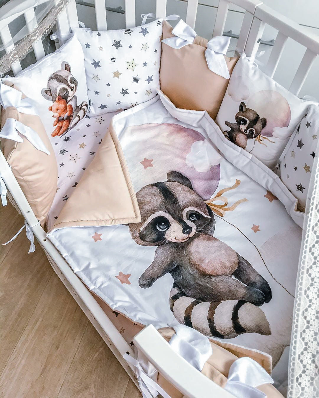 Cotton fabric with a print of cute raccoon with white balloon