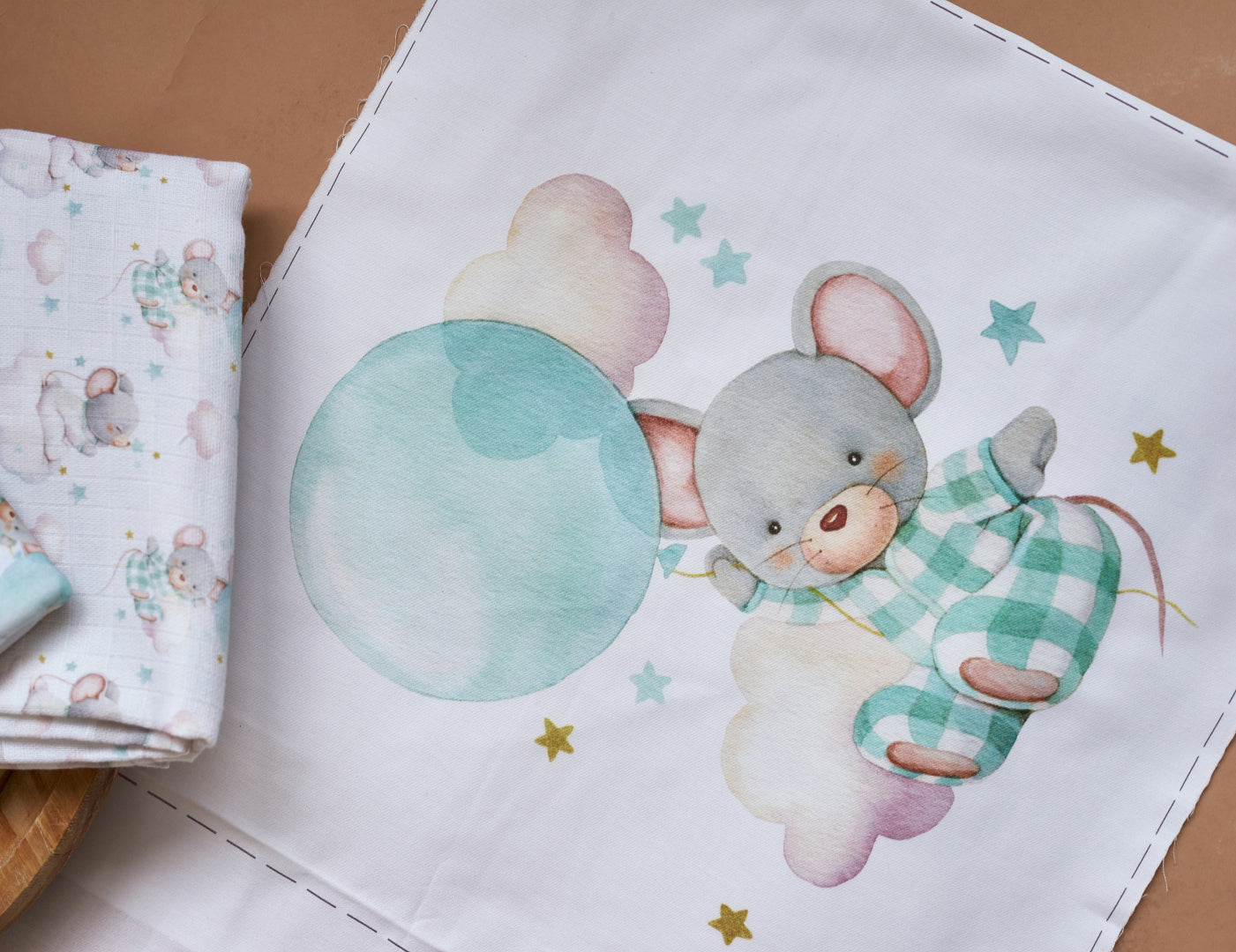 Cotton fabric with a print of cute mint baby mouse with blue balloon