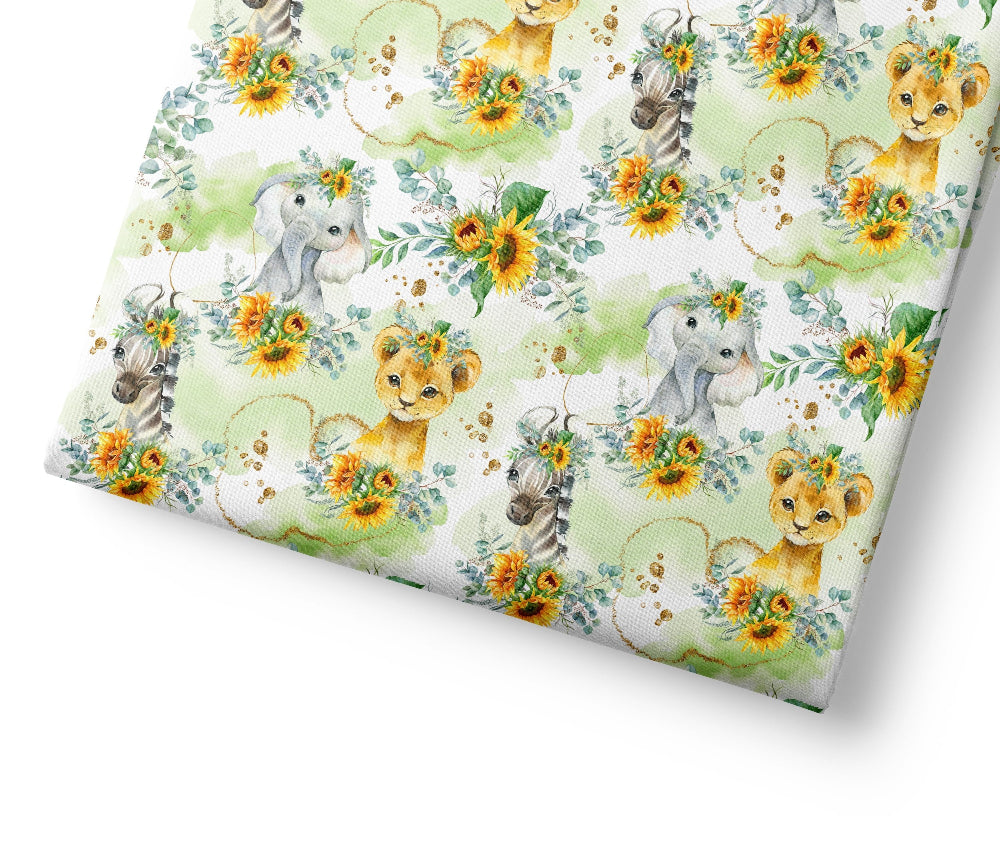 Patterned paper with safari animals and sunflowers on a white background
