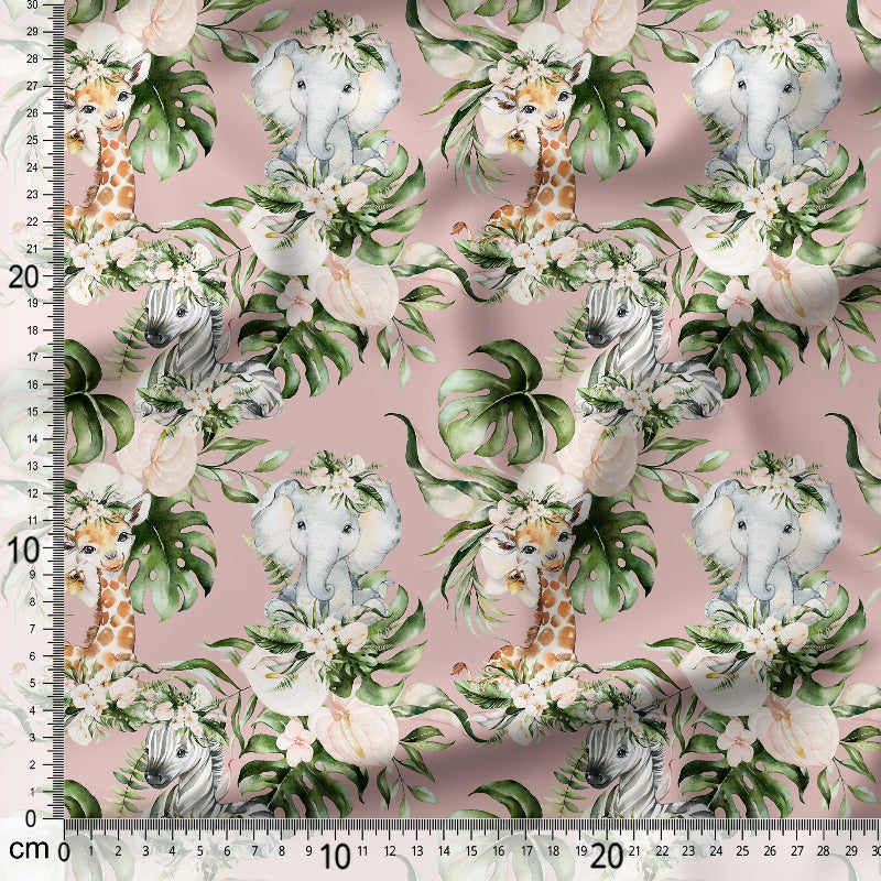Fabric with baby animals and floral pattern on a pink background, measured with a ruler.