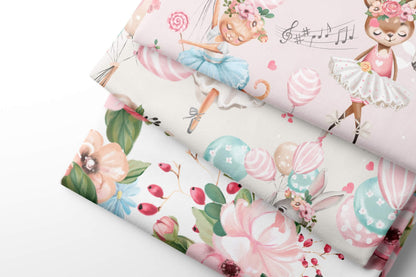 Floral and animal-themed patterned coordinating fabric with colorful designs on a white background