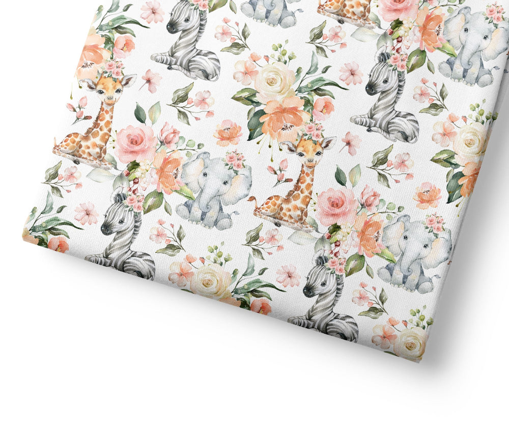 Floral patterned fabric with animal illustrations on a white background