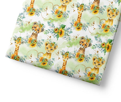 Fabric with lion and giraffe pattern on a white background