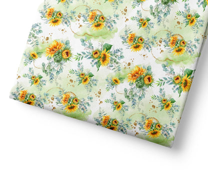Floral patterned paper with sunflowers on a white background