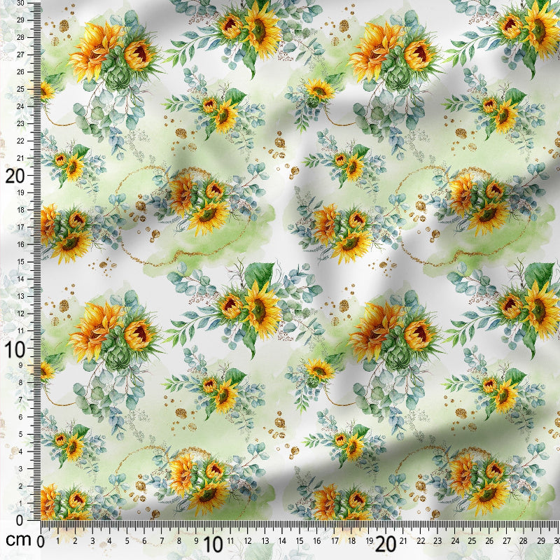 Floral pattern with sunflowers and greenery on a white background, measured against a ruler.