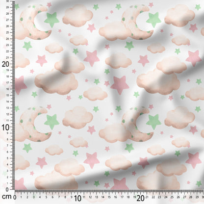 Fabric with cloud and star pattern on a white background, measured with a ruler.