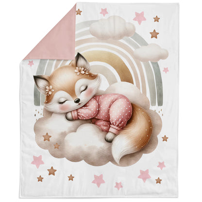 Blanket with a fox design on a cloud, rainbow, and stars