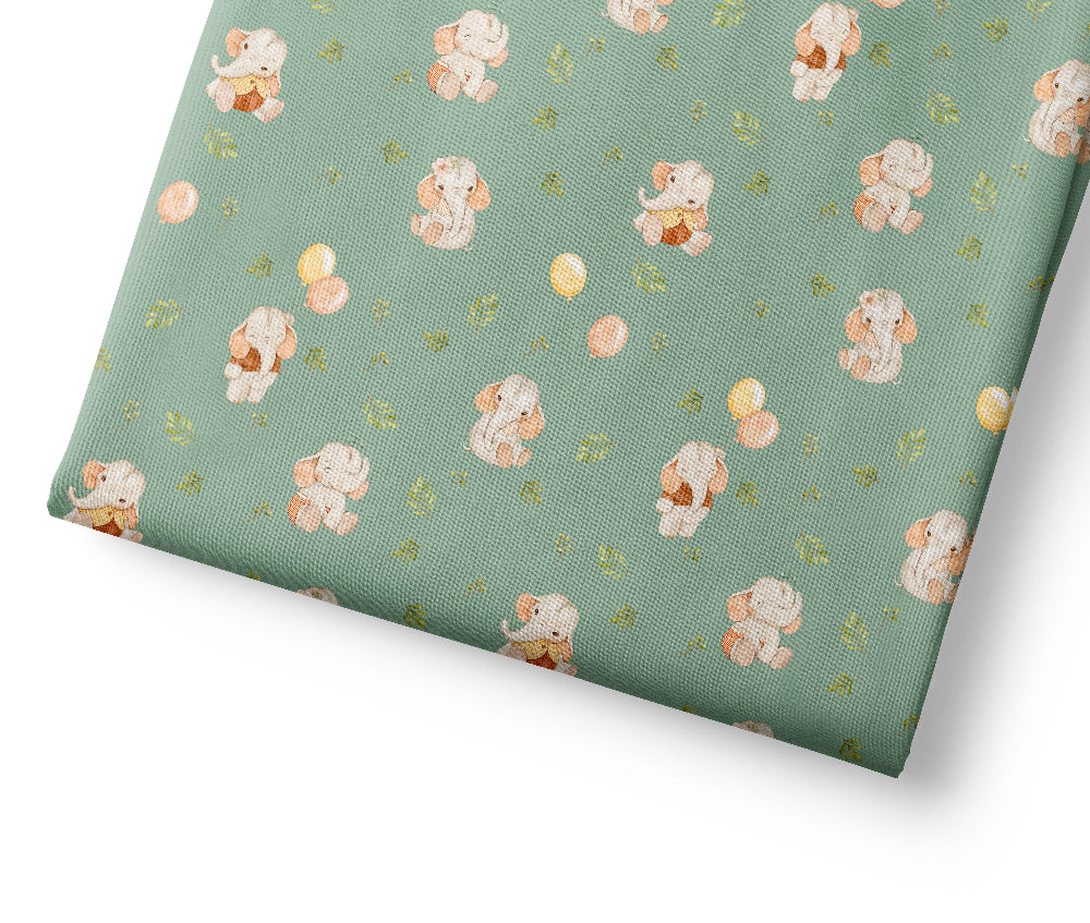Green coordinating fabric with elephant and flower pattern