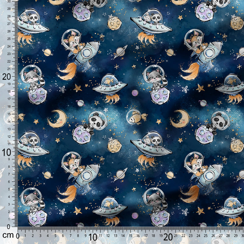 Fabric with space-themed pattern featuring UFOs, planets, and cats on a blue background.