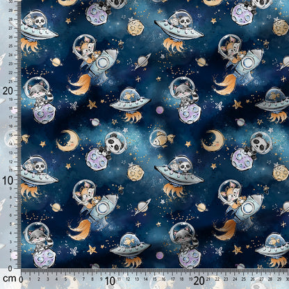 Fabric with space-themed pattern featuring UFOs, planets, and cats on a blue background.