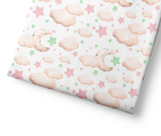 Patterned coordinating fabric with clouds and stars on a white background