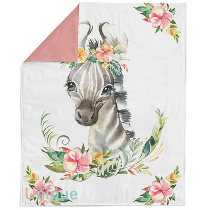 A fabric panel featuring a printed zebra and floral design with a pink border at the top.