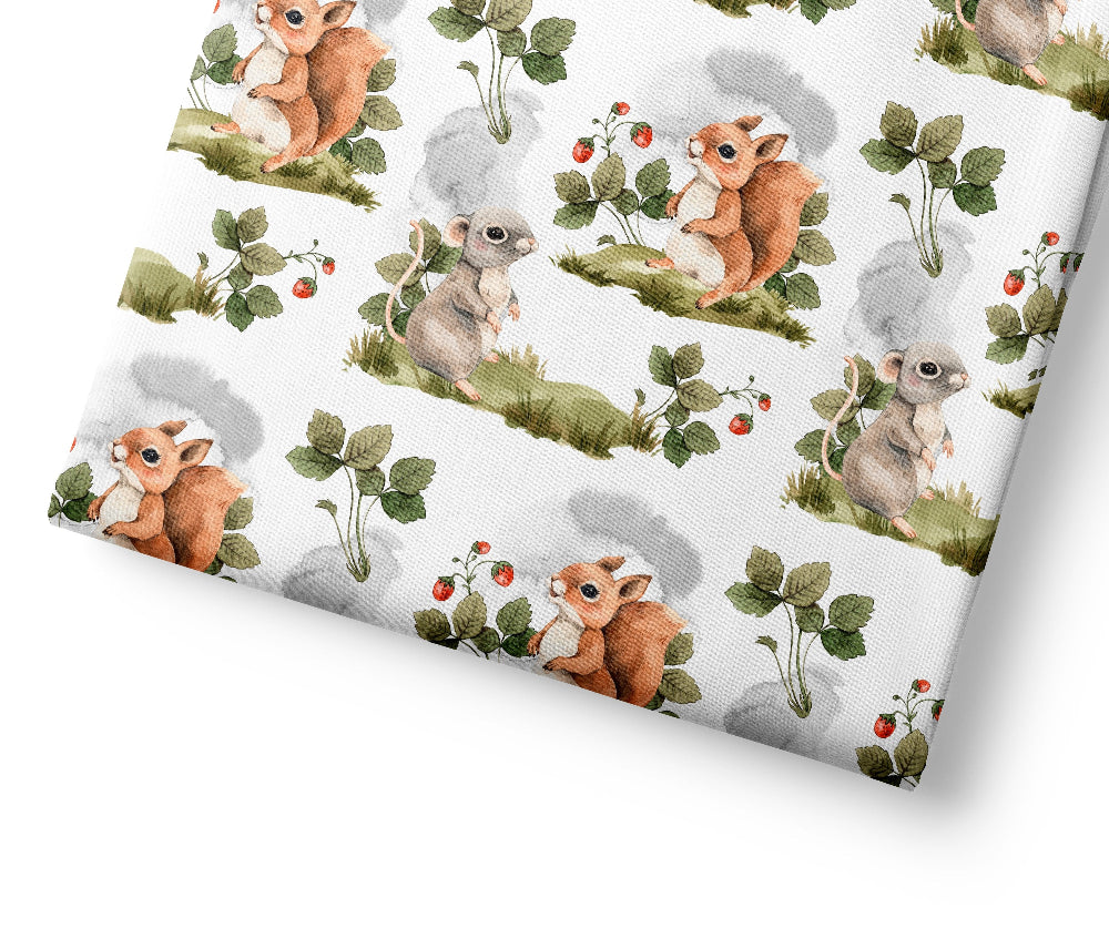 Patterned paper with cartoon animals and plants on a white background