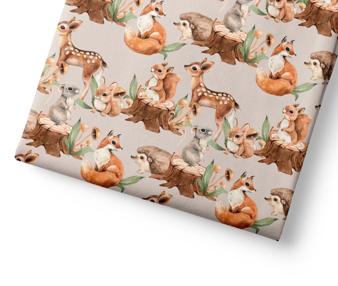 Woodland animal pattern on a beige background