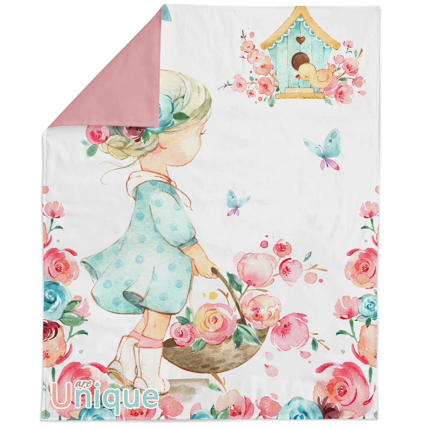 A fabric panel featuring a printed design with a blonde girl and floral elements on a white background