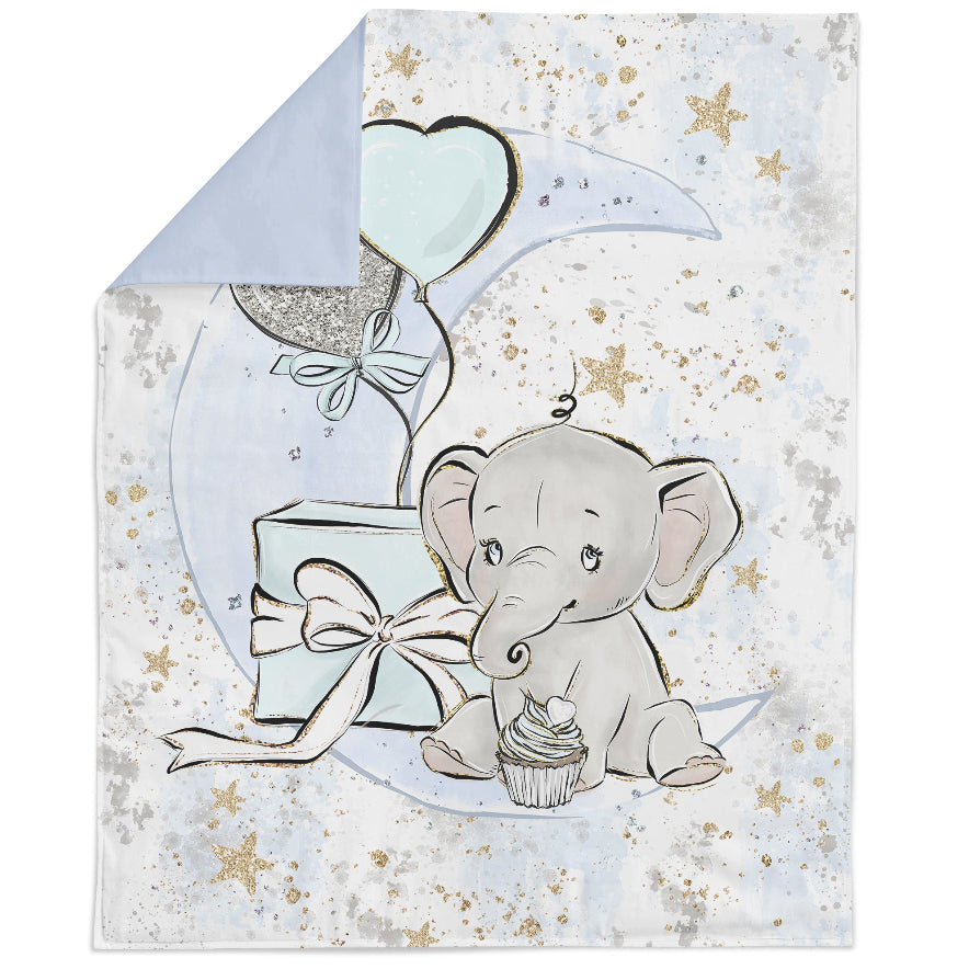 A fabric panel featuring a cute baby elephant design with a blue moon and stars background, holding a balloon and a cupcake, intended for quilting and crafts.