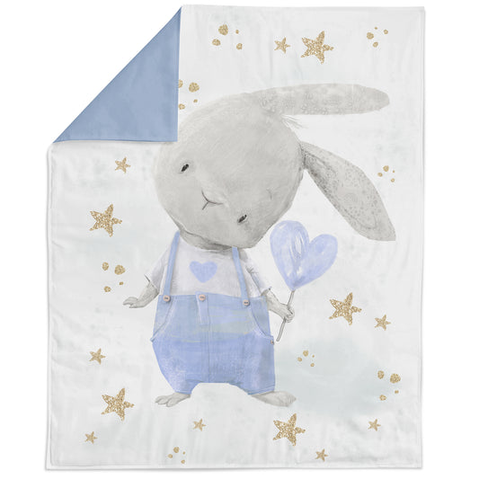 A fabric panel featuring a cute blue bunny with a heart, surrounded by stars, on a blue background.