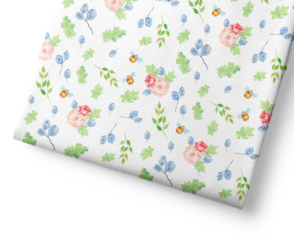 Floral patterned coordinating fabric with peter rabbit and flowers on a white background