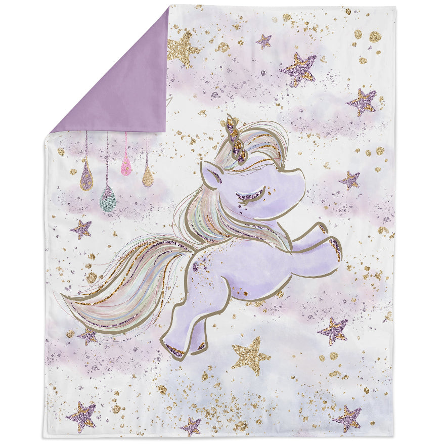 A fabric panel featuring a printed unicorn and stars design on a purple background with a glittery finish.