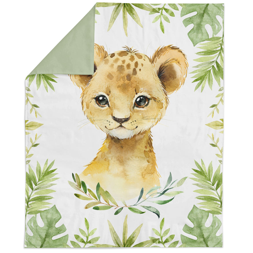 Fabric panel with a watercolor-style illustration of a leopard among green foliage, intended for quilting and sewing into bed linen or blankets.