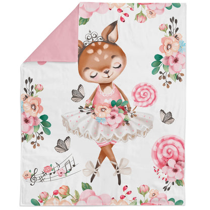 Floral blanket with a deer character in a tutu surrounded by flowers and butterflies.