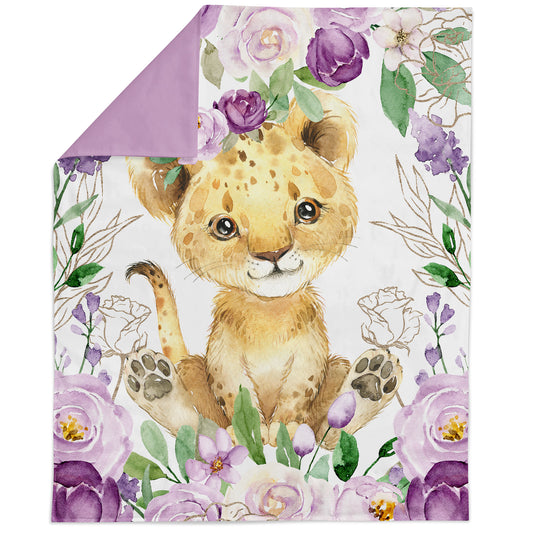 A fabric panel featuring an illustrated lion among purple and pink flowers, designed for quilting and crafting.