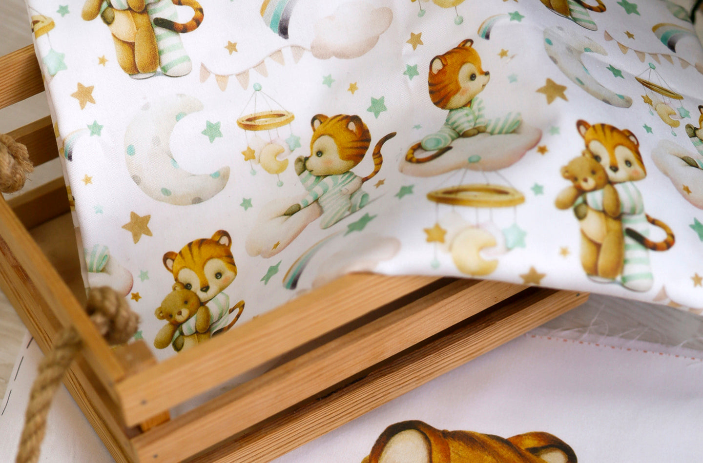 Cotton fabric with cute lions in mint pizamas, space theme