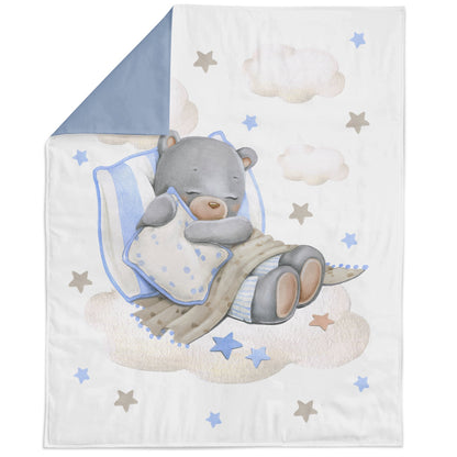 Fabric panel featuring a cute bear and stars design, intended for quilting and crafting.