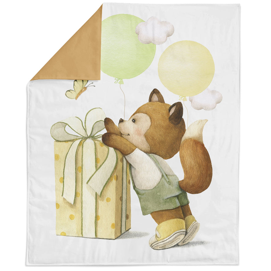 A fabric panel featuring a cute fox character interacting with a present, with a balloon and a green ribbon.