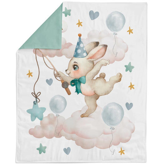 Fabric panel featuring a cartoon rabbit with a party hat, balloons, and star decorations, on a white background.