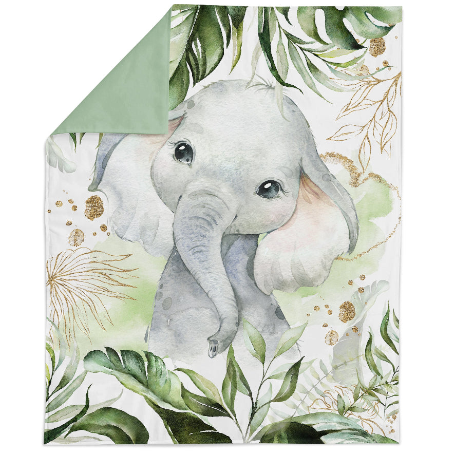 A fabric panel featuring a printed elephant design with green and brown tones, intended for quilting and crafting.