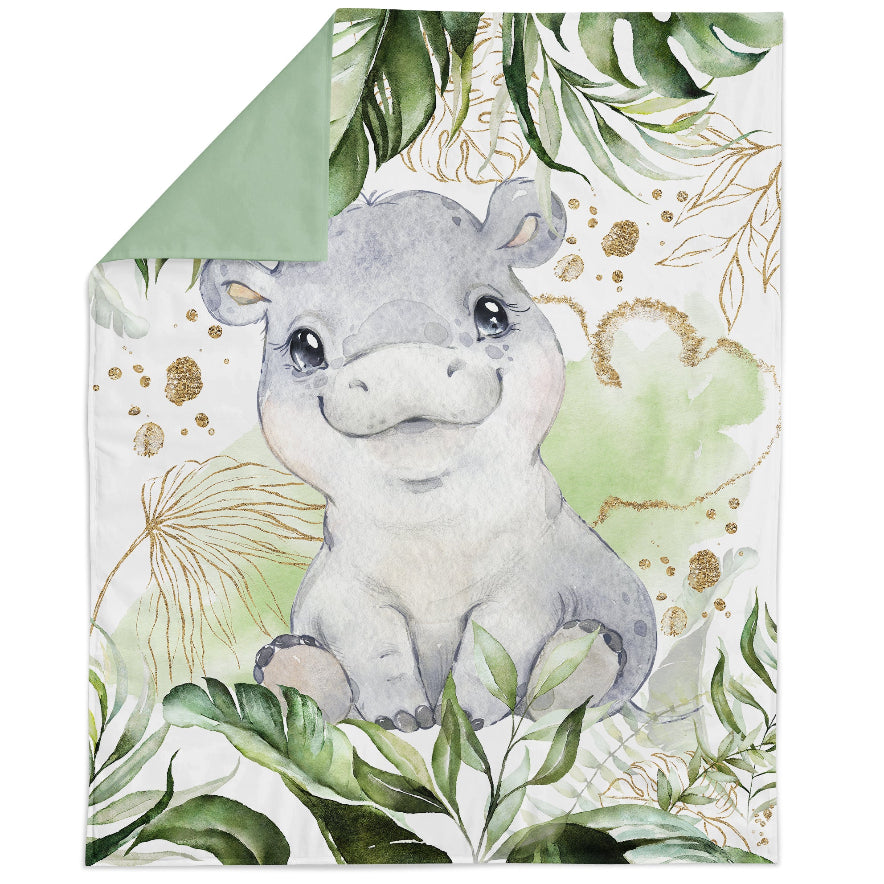 Fabric panel with a printed design featuring a cartoon hippopotamus in a jungle setting, surrounded by green foliage and gold accents.