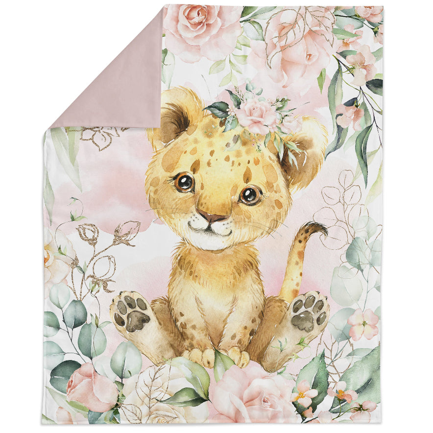 A fabric panel featuring a printed design with a cartoon lion in a floral setting, predominantly pink and green in color.