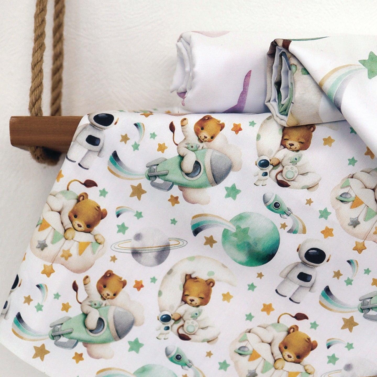 Cotton fabric with sleeping lions, space theme